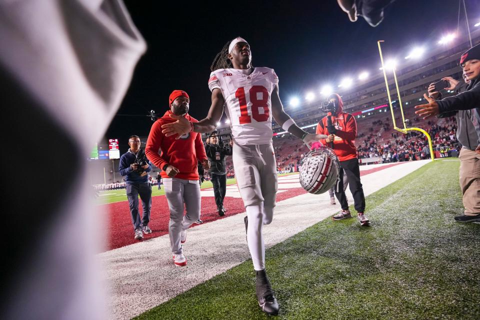 Ohio State wide receiver Marvin Harrison Jr. leaves the field following the Buckeyes' 24-10 win at Wisconsin.
