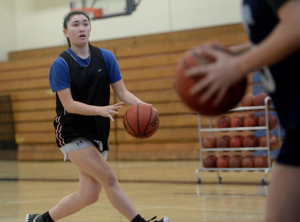 Emily Lim gets ready to take a shot during Camarillo High's practice on Tuesday. Lim is part of a talented supporting cast for the unbeaten Scorpions.