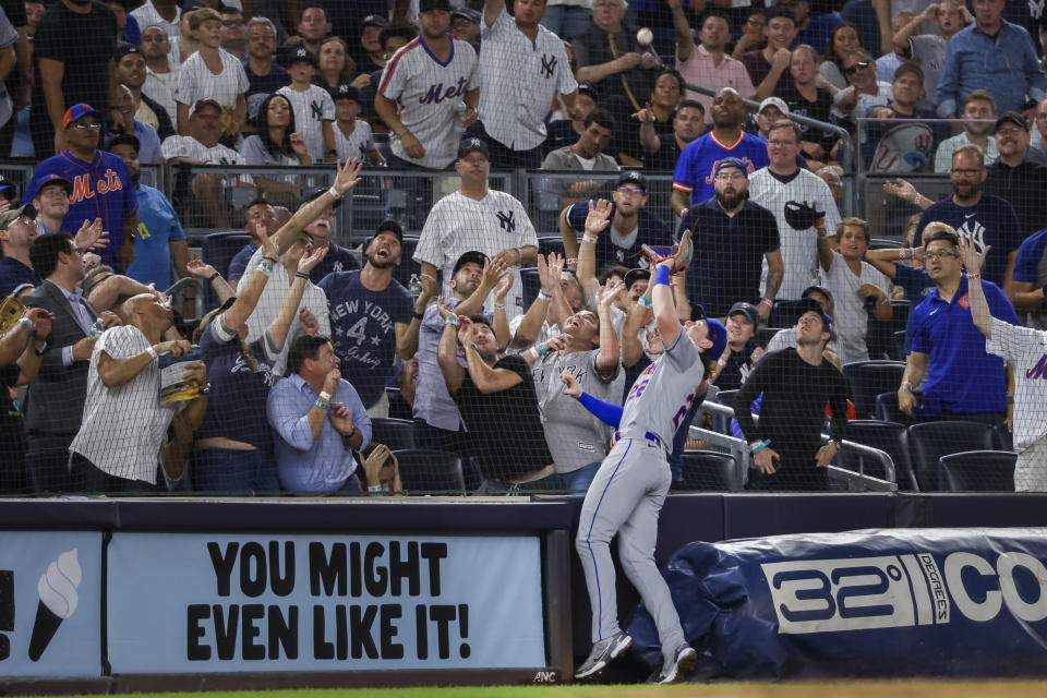 New York Mets third baseman Brett Baty catches a foul popup by New York Yankees' Josh Donaldson in the eighth inning of a baseball game, Monday, Aug. 22, 2022, in New York. (AP Photo/Corey Sipkin)