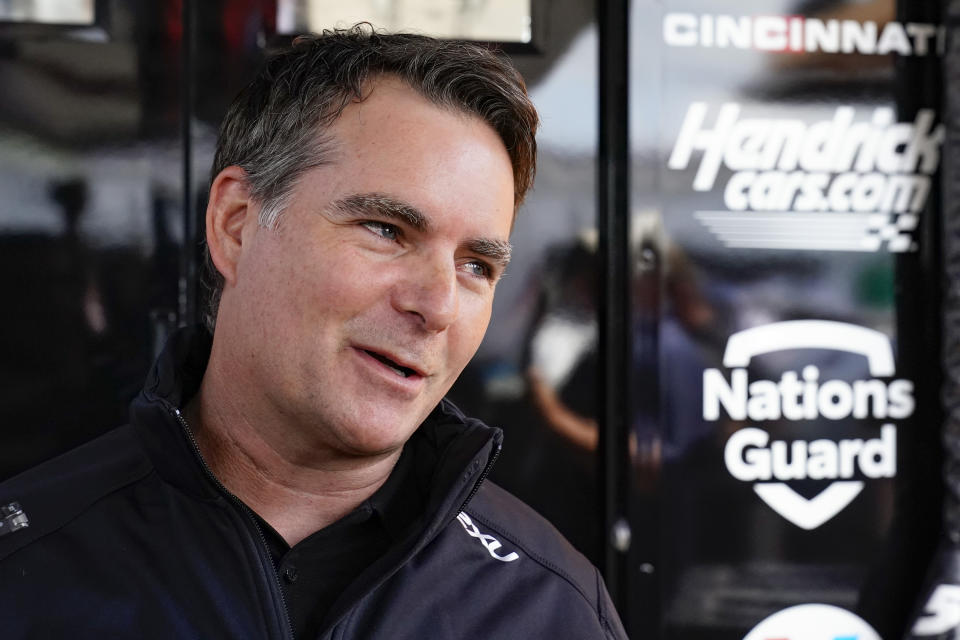 FILE - Former Nascar driver Jeff Gordon speaks at a news conference outside a Hendrick Motorsports trailer before the scheduled races at Pocono Raceway, Sunday, June 27, 2021, in Long Pond, Pa. Rick Hendrick and Hendrick Motorsports are marking the 40th anniversary of NASCAR’s winningest team. Now 74 years old, his season-long NASCAR celebration has made him both reflective and focused on what will become of his companies. (AP Photo/Matt Slocum, File)