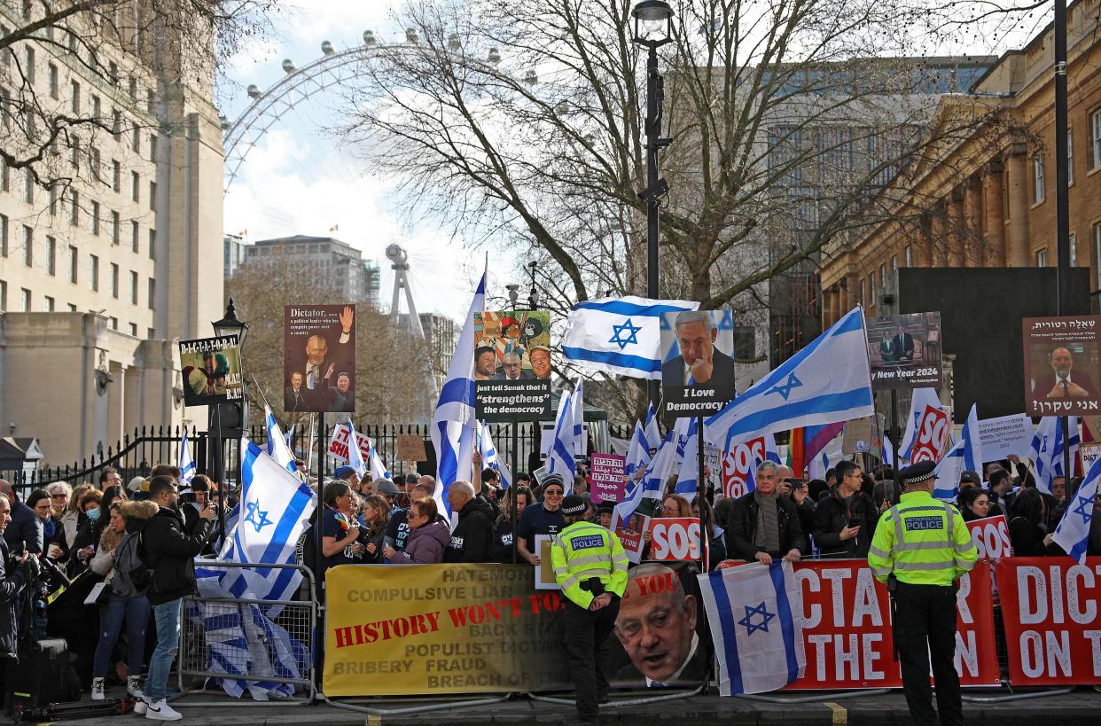 Anti-Netanyahu protesters gather opposite Downing Street (AFP/Getty)
