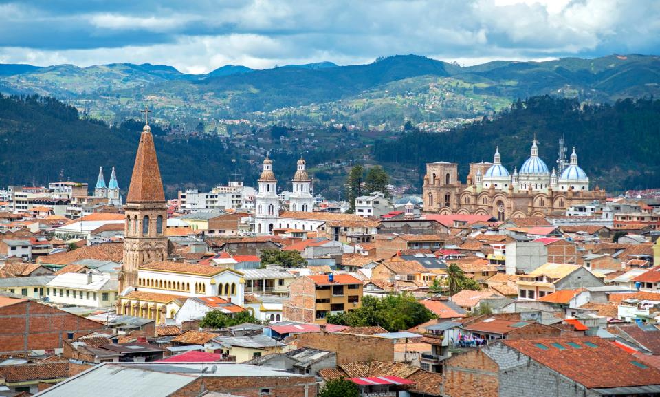 View of the city of Cuenca, Ecuador, with it's many churches and rooftops, on a cloudy day