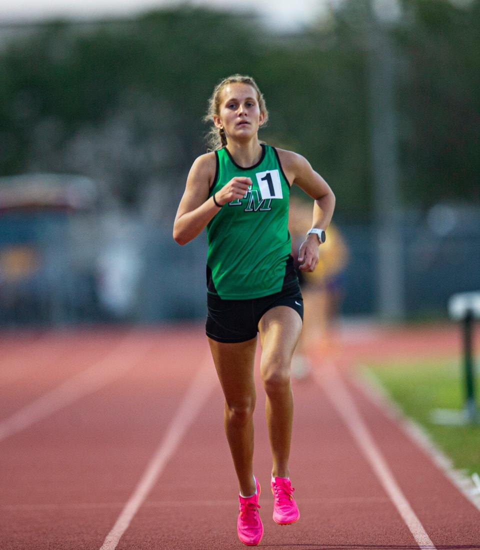 Masha Dorofeev from Fort Myers High School  leads the 3200 meters during the FHSAA 3A District 11 track & field meet at Dunbar High School on April 20, 2023. She won. 