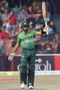 Pakistan batsman Babar Azam celebrates after completing his fifty runs during the second T20 cricket match against Bangladesh at Gaddafi stadium, in Lahore, Pakistan, Saturday, Jan. 25, 2020. (AP Photo/K.M. Chaudary)