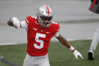 Ohio State receiver Garrett Wilson celebrates his touchdown against Indiana during the first half of an NCAA college football game Saturday, Nov. 21, 2020, in Columbus, Ohio. (AP Photo/Jay LaPrete)