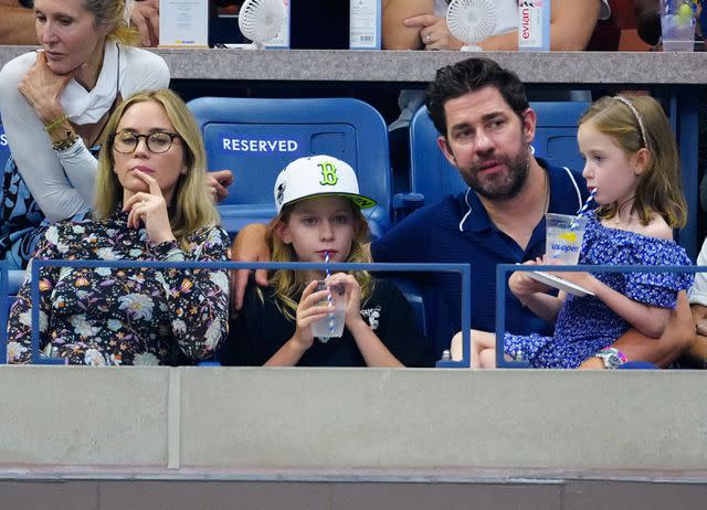 <p> Gotham/GC</p> Emily Blunt and John Krasinski at the 2023 US Open with their daughters.
