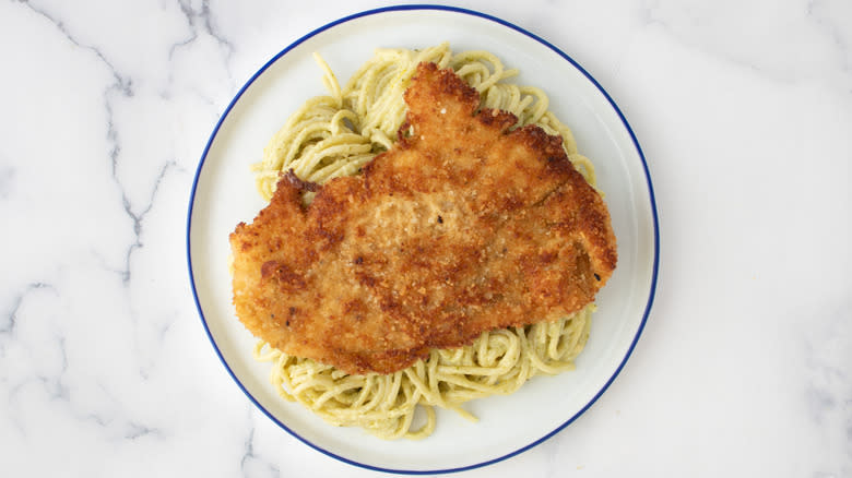 chicken cutlet on spaghetti