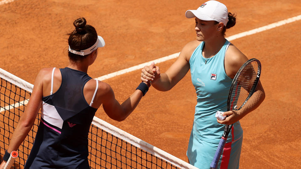 Ash Barty and Veronika Kudermetova, pictured here after their clash at the Italian Open.