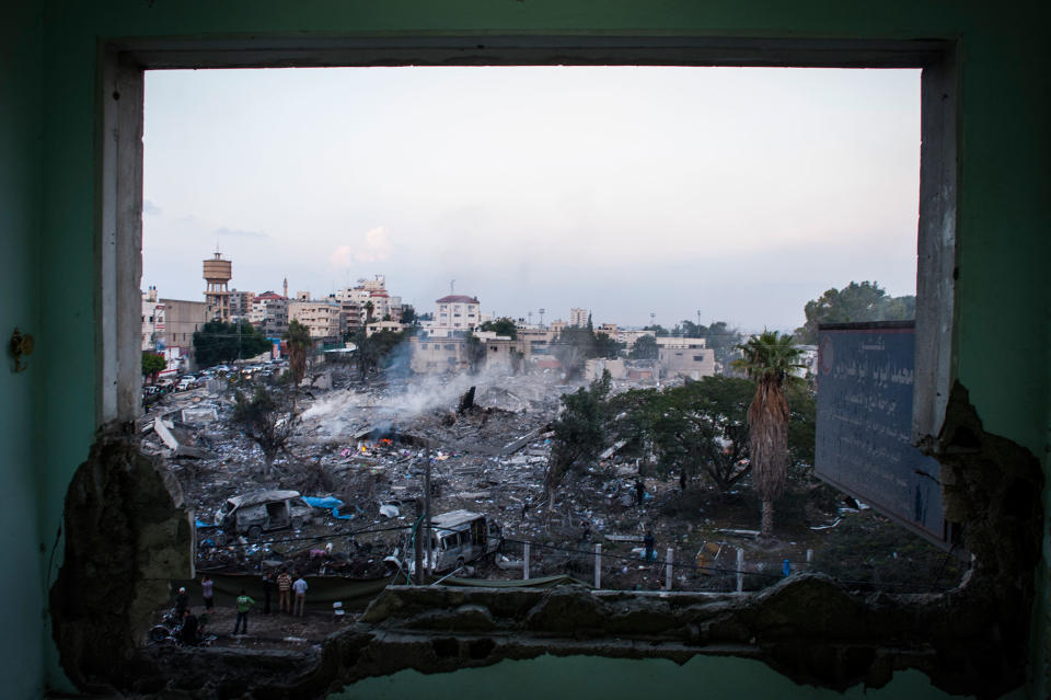 <p>Hours after a ceasefire was declared between Hamas and Israel, the people of Gaza City begin to rebuild. Shops open and families go out to witness the damage incurred by the recent strikes. (Photograph by Monique Jaques) </p>