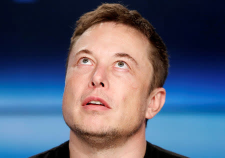 FILE PHOTO: SpaceX founder Elon Musk pauses at a press conference following the first launch of a SpaceX Falcon Heavy rocket at the Kennedy Space Center in Cape Canaveral, Florida, U.S., February 6, 2018. REUTERS/Joe Skipper/File Photo