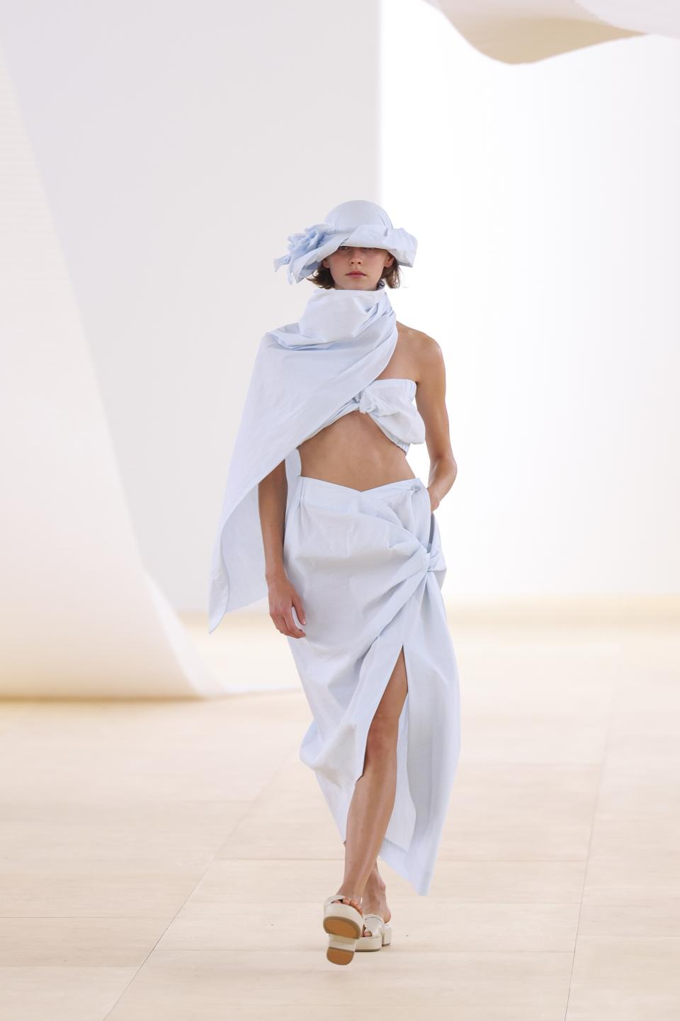 A model wears a creation for the Issey Miyake Spring/Summer 2024 womenswear fashion collection presented Friday, Sept. 29, 2023 in Paris. (AP Photo/Vianney Le Caer)