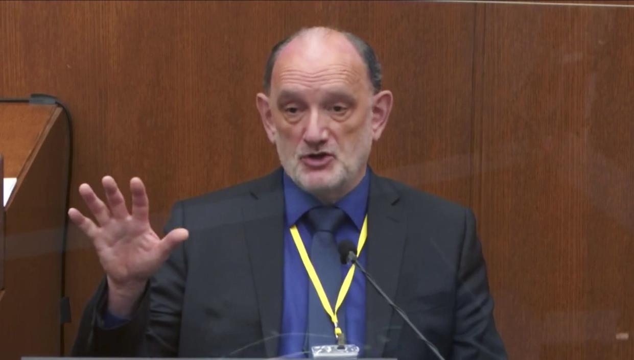 In this image from video, Dr. David Fowler, a retired forensic pathologist and former chief medical examiner for the state of Maryland testifies on April in the trial of former Minneapolis police Officer Derek Chauvin at the Hennepin County Courthouse in Minneapolis, Minn. 