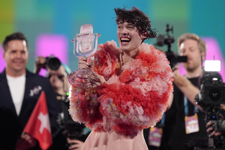 Nemo of Switzerland, who performed the song The Code, celebrates after winning the Grand Final of the Eurovision Song Contest in Malmo, Sweden, Sunday, May 12, 2024. (AP Photo/Martin Meissner)