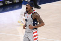 Washington Wizards guard Bradley Beal (3) reacts after he made a three-point basket during the second half of an NBA basketball game against the Minnesota Timberwolves, Saturday, Feb. 27, 2021, in Washington. (AP Photo/Nick Wass)