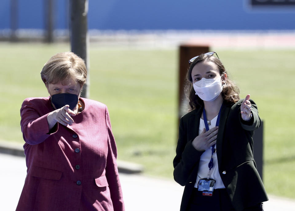 German Chancellor Angela Merkel arrives for a NATO summit at NATO headquarters in Brussels, Monday, June 14, 2021. U.S. President Joe Biden is taking part in his first NATO summit, where the 30-nation alliance hopes to reaffirm its unity and discuss increasingly tense relations with China and Russia, as the organization pulls its troops out after 18 years in Afghanistan. (Kenzo Tribouillard, Pool via AP)