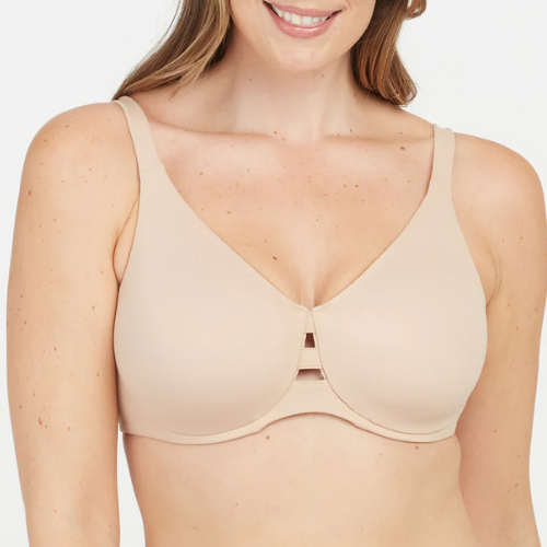If you're dealing with too-tight shoulder straps or bands creating bulges or imprints, this is a solid solution. For a more modest look, this style smooths all around while offering the coverage you're looking for. $68, Spanx. <a href="https://spanx.com/collections/plus-size-dd-up/products/low-profile-minimizer-bra" rel="nofollow noopener" target="_blank" data-ylk="slk:Get it now!" class="link ">Get it now!</a>