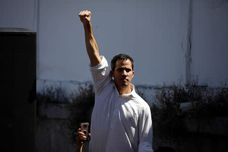 Juan Guaido, President of the Venezuelan National Assembly and lawmaker of the opposition party Popular Will (Voluntad Popular), gestures while he arrives to a gathering in La Guaira, Venezuela January 13, 2019. REUTERS/Carlos Garcia Rawlins