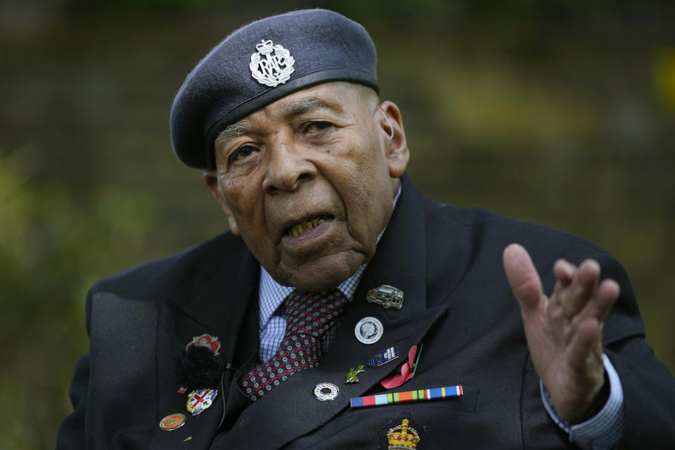 Gilbert Clarke a D-Day veteran gestures as he is interviewed near his home in east London, Wednesday, May 15, 2024. Clarke, now 98, is one of more than 3 million men and women from South Asia, Africa and the Caribbean who served in the British military during World War II. (AP Photo/Kirsty Wigglesworth)