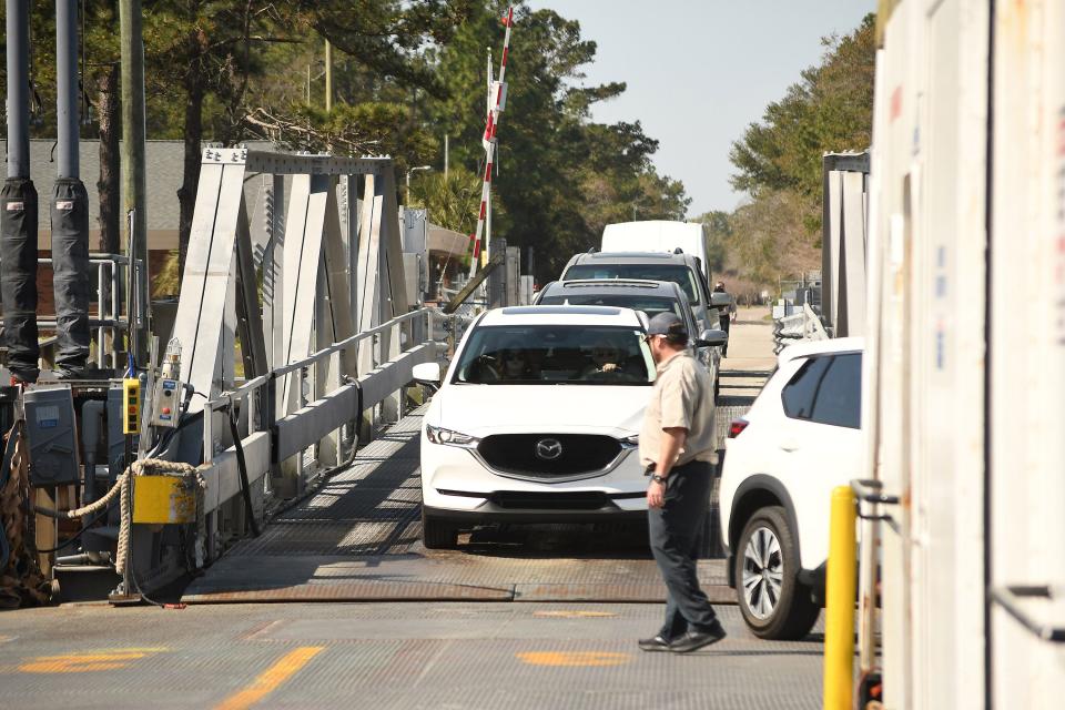 Ferry travelers board the Fort Fisher-Southport ferry from Southport March 13, 2024. KEN BLEVINS/STARNEWS