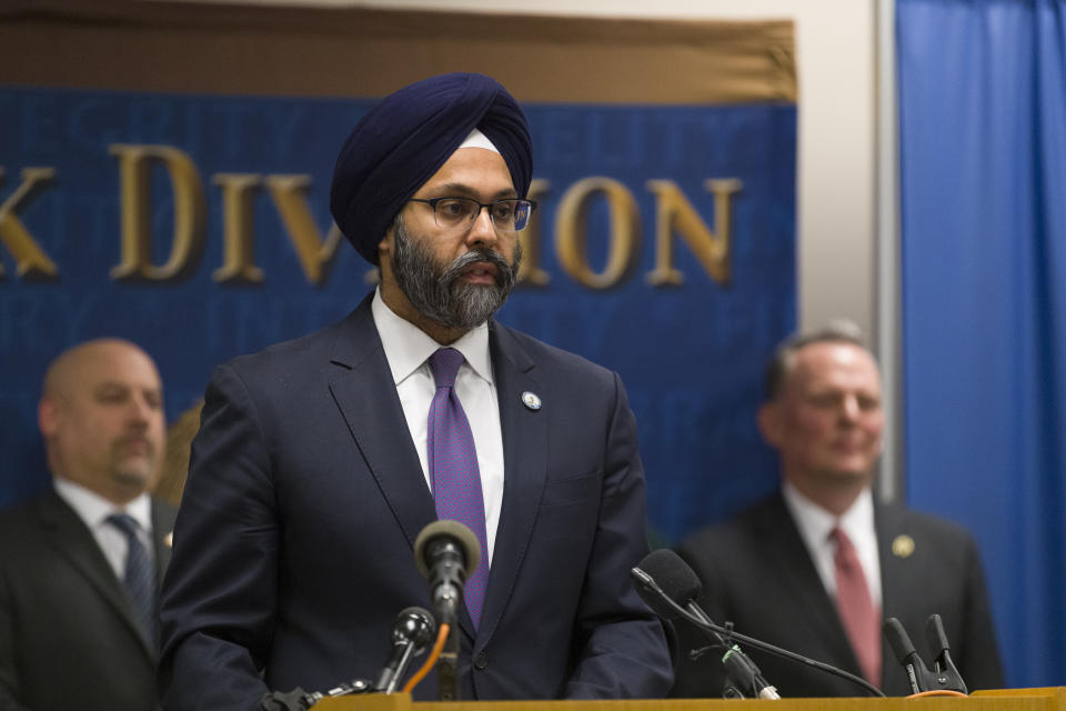 FILE - In this Jan. 13, 2020 file photo, New Jersey Attorney General Gurbir Grewal makes a statement at a new conference to provide an update on the Dec. 10 Jersey City shootings at the FBI headquarters in Newark, N.J. Cases involving police use of force often include questions about the internal records of the officers involved, records that in most cases are off-limits to the press and public. Lawmakers in at least 13 states have considered bills this year to make those records more publicly available. (Steve Hockstein/NJ Advance Media via AP)