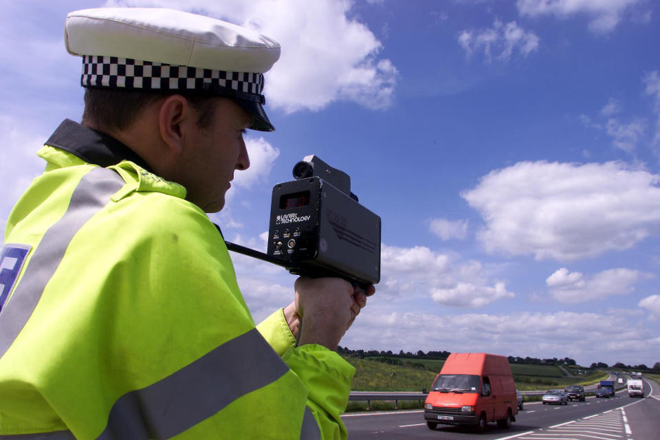 Sgt Paul Moor from Essex Traffic Police uses a laser speed gun on the new stretch of the A130 between Chelmsford and Southend. Forty motorists who drove above 100mph on the new road are appearing at a special court hearing at Witham Magistrates Court.  