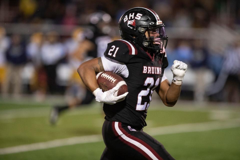 Nov 17, 2023; Louisville, KY, USA; Ballard running back Journey Wyche (21) runs the ball during the third round of KHSAA Class 6A playoffs against Central Hardin at Ballard High School. Mandatory Credit: Michelle Hutchins-The Courier-Journal