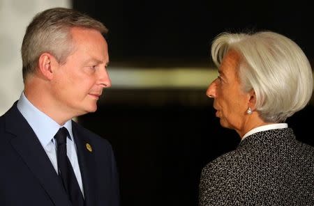 France's Finance Minister Bruno Le Maire and International Monetary Fund (IMF) Managing Director Christine Lagarde talk after posing for the official photo at the G20 Meeting of Finance Ministers in Buenos Aires, Argentina, July 21, 2018. REUTERS/Marcos Brindicci