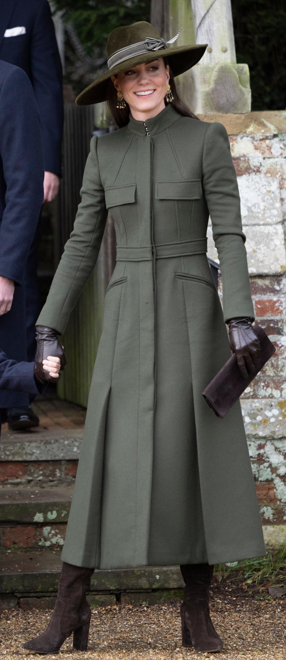 Kate Middleton in a green coat dress on Christmas in 2022.