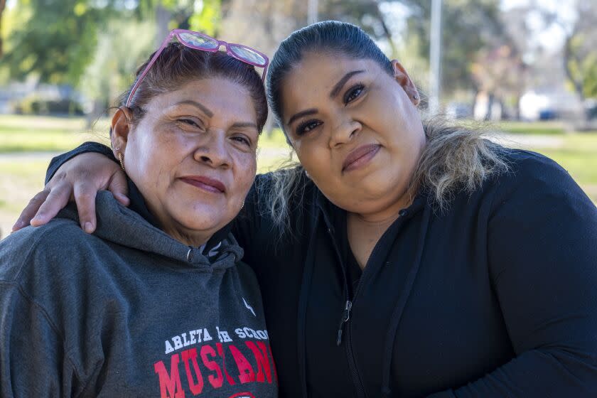 Pacoima, CA - December 20: Portrait of Florentina Serna and her daughter, Maria Serna, in Branford Park on Tuesday, Dec. 20, 2022, in Pacoima, CA. Florentina Serna has waited more than three decades to cast a ballot. She still can't. When election day comes around and she sees the propositions and candidates and knows she can't do a thing to help change her hometown, she said, it makes her feel powerless. Her daughter, Maria Serna, can vote, and is registered to vote, but rarely exercises the right her 55-year-old mother covets. It's a circumstance that frustrates Florentina - and anyone who runs for office in the city of Los Angeles. (Francine Orr / Los Angeles Times)