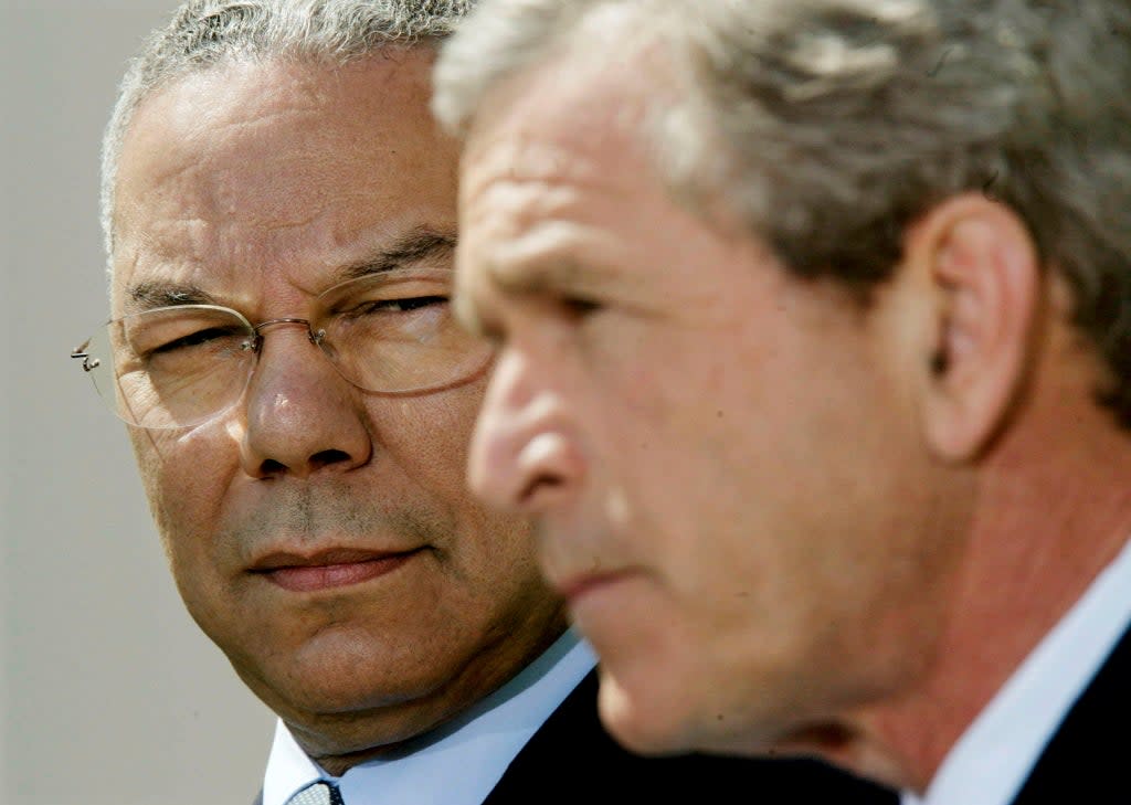 Colin Powell and George W. Bush (REUTERS)