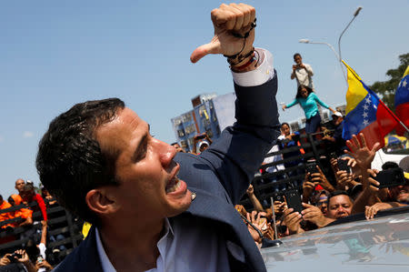 Venezuelan opposition leader Juan Guaido, who many nations have recognised as the country's rightful interim ruler, takes part in a rally against Venezuelan President Nicolas Maduro's government, in Guacara, Venezuela March 16, 2019. REUTERS/Carlos Jasso