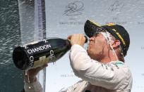 Belgium Formula One - F1 - Belgian Grand Prix 2016 - Francorchamps, Belgium - 28/8/16 - Mercedes' Nico Rosberg of Germany celebrates on the podium after the Belgian F1 Grand Prix. REUTERS/Yves Herman