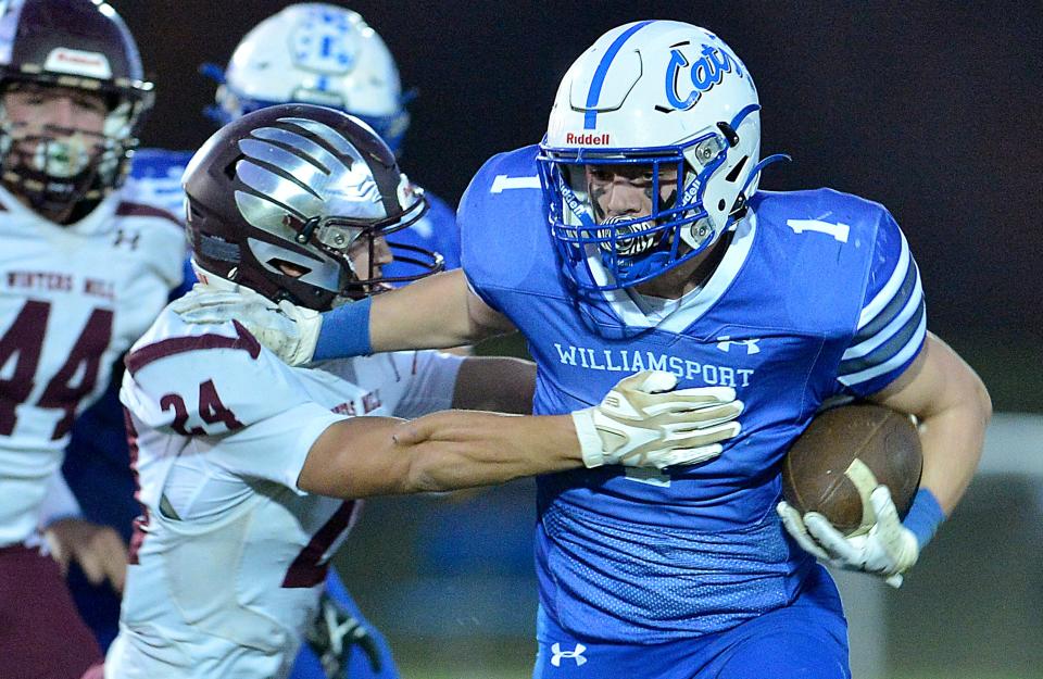 Williamsport's Cole Rourke (1) rushed for three touchdowns in the first half of the Wildcats' 41-21 victory over Winters Mill in the first round of the Class 2A-1A West playoffs on Nov. 4, 2022.