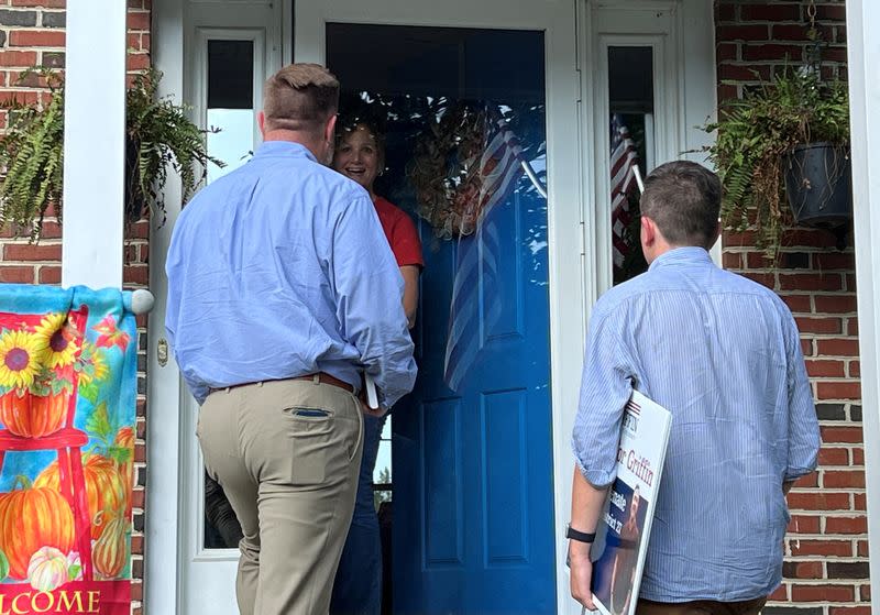 Democratic candidate for Virginia State Senate District 27 Joel Griffin talks to a voter in Stafford