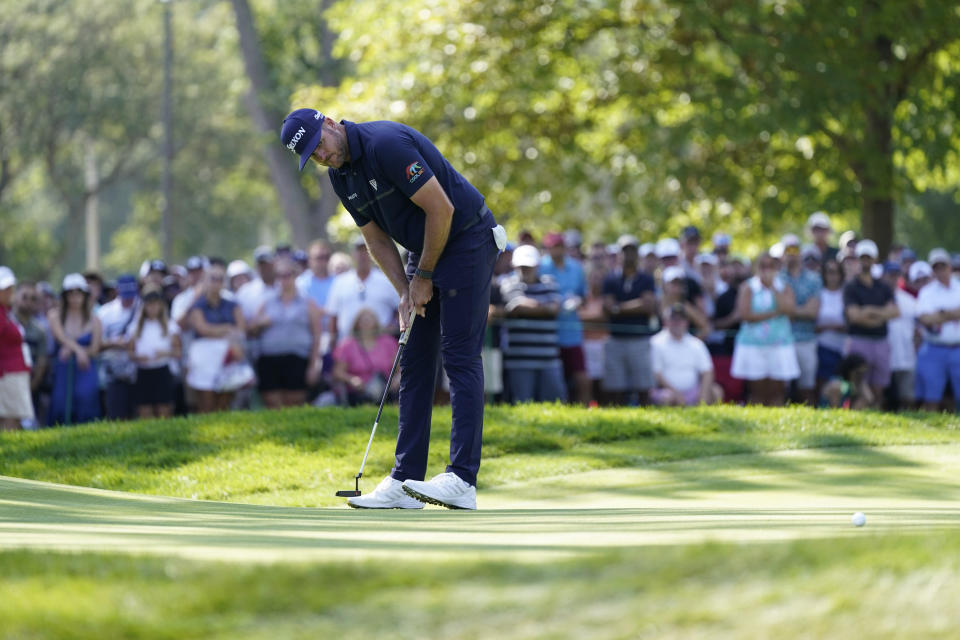 Taylor Pendrith reacts after missing his birdie attempt on the ninth green during the final round of the Rocket Mortgage Classic golf tournament, Sunday, July 31, 2022, in Detroit. (AP Photo/Carlos Osorio)