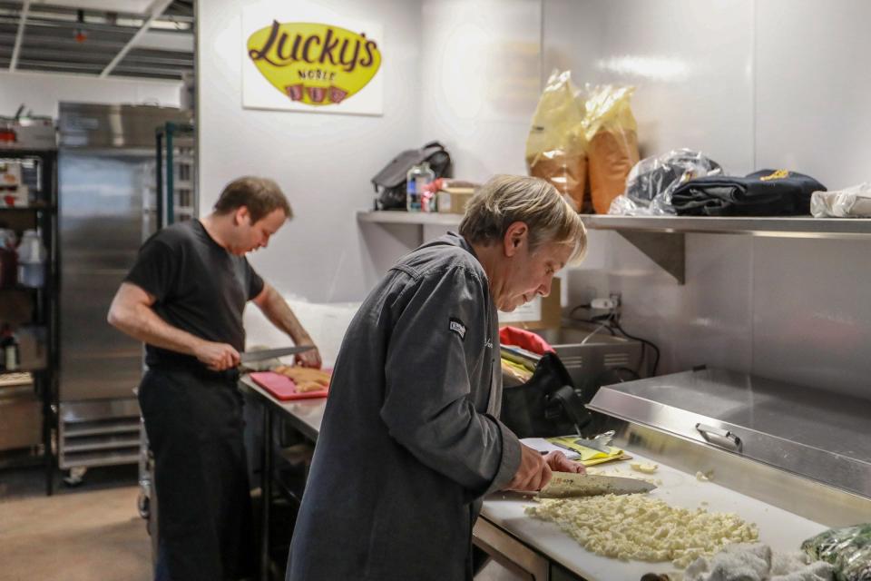 Chefs Jimmy Schmidt and Brian Recor prep for the grand opening of Lucky's Noble BBQ, one of four restaurants featured at Fort Street Galley restaurant in Detroit, photographed on Thursday, Dec. 6, 2018. 