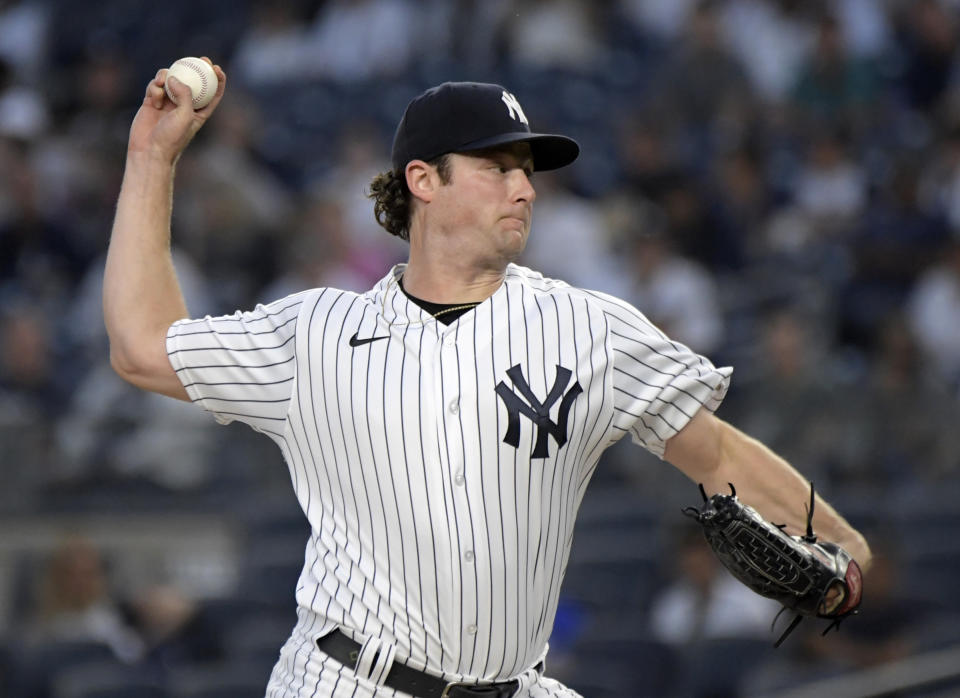 New York Yankees pitcher Gerrit Cole delivers the ball to a Toronto Blue Jays batter during the first inning of a baseball game Tuesday, Sept. 7, 2021, at Yankee Stadium in New York. (AP Photo/Bill Kostroun)