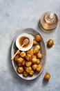 <p>Toss fried dough balls in honey, orange blossom water, and cardamom for a memorable sweet that everyone will be snacking on.</p><p><em><a href="https://www.goodhousekeeping.com/food-recipes/a25309999/hanukkah-honey-balls-recipe/" rel="nofollow noopener" target="_blank" data-ylk="slk:Get the recipe for Hanukkah Honey Balls »;elm:context_link;itc:0;sec:content-canvas" class="link ">Get the recipe for Hanukkah Honey Balls »</a></em></p><p><strong>RELATED: </strong><a href="https://www.goodhousekeeping.com/holidays/g4014/hanukkah-foods/" rel="nofollow noopener" target="_blank" data-ylk="slk:17 Delicious Hanukkah Recipes You Need to Make This Year;elm:context_link;itc:0;sec:content-canvas" class="link ">17 Delicious Hanukkah Recipes You Need to Make This Year</a><br></p>