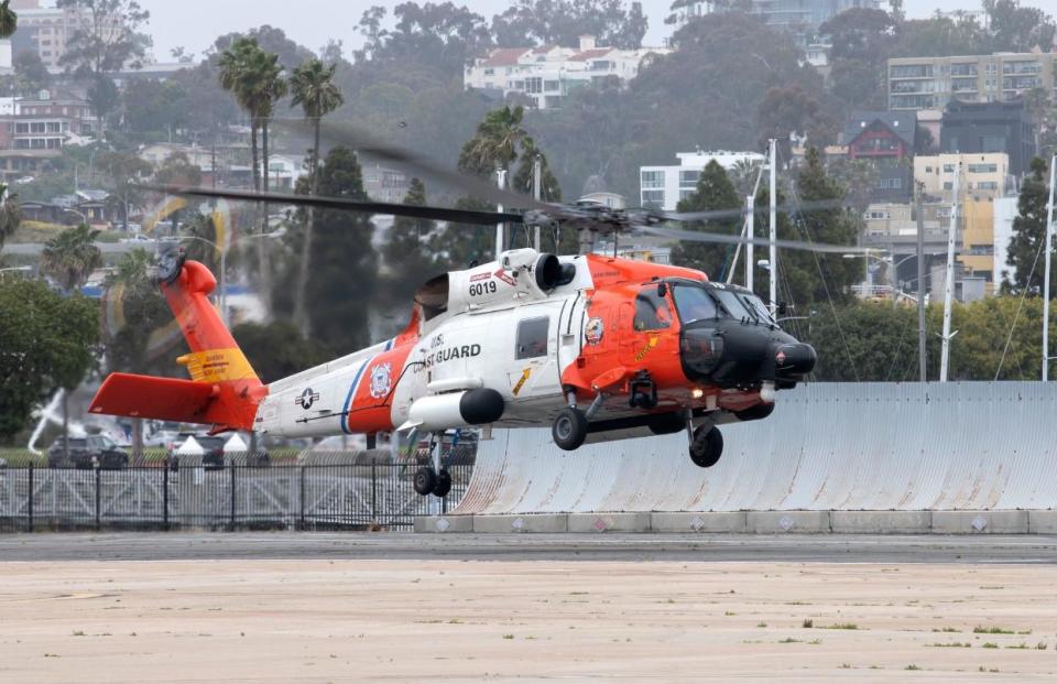 An   MH-60 Jayhawk helicopter takes off from   U.S. Coast Guard Air Station San Diego to take part in search efforts for three people after a Learjet crashed near San Clemente Island. May 10, 2023.  / Credit: U.S. Coast Guard/Twitter