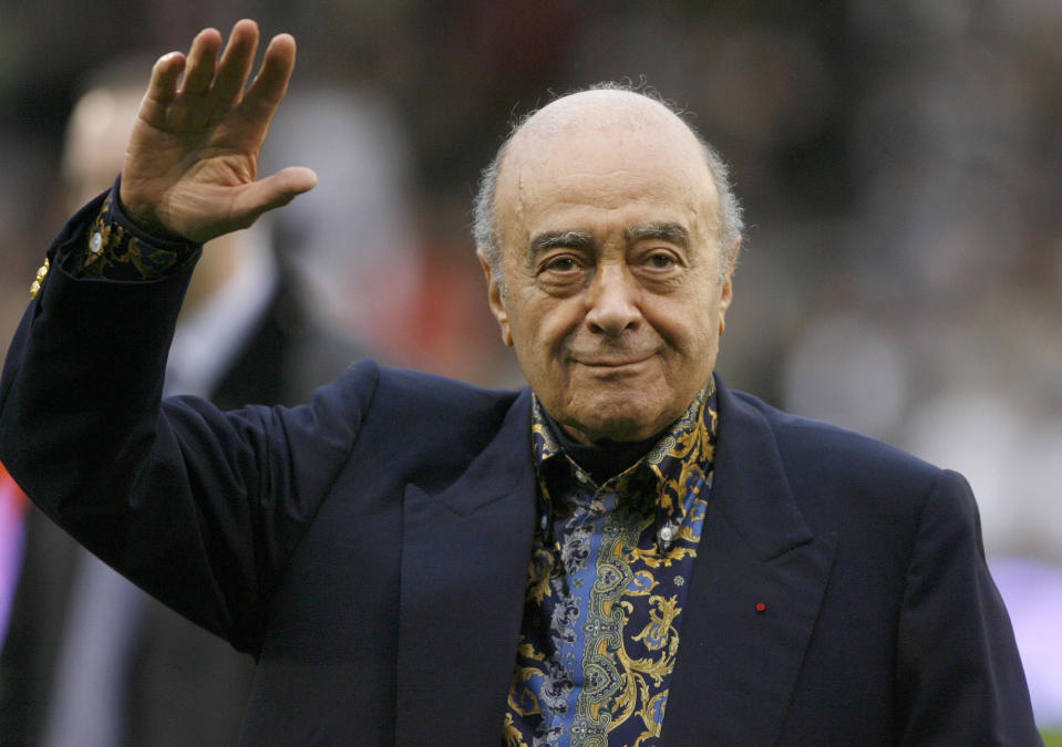 FILE - Fulham owner Mohamed Al Fayed waves to the crowd before the English Premier League soccer match against Tottenham Hotspur at Craven Cottage stadium, London, Nov. 15, 2008. Al Fayed, the former Harrods owner whose son Dodi was killed in a car crash with Princess Diana, has died at age 94. His death was announced Friday, Sept. 1, 2023, by Fulham Football Club, which Al Fayed once owned. (AP Photo/Simon Dawson, File)