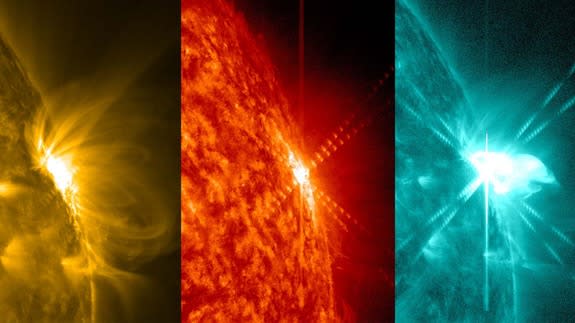 A solar flare erupts from the sun on March 12, 2014. NASA's Solar Dynamics Observatory captured it in several wavelengths of light, shown here in different colors.