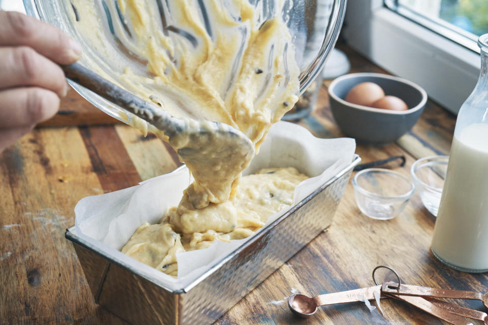 Someone making homemade banana bread.