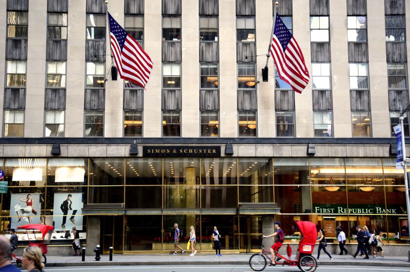 The headquarters for the Simon & Schuster book pubishing company is on Avenue of the Americas in New York City.