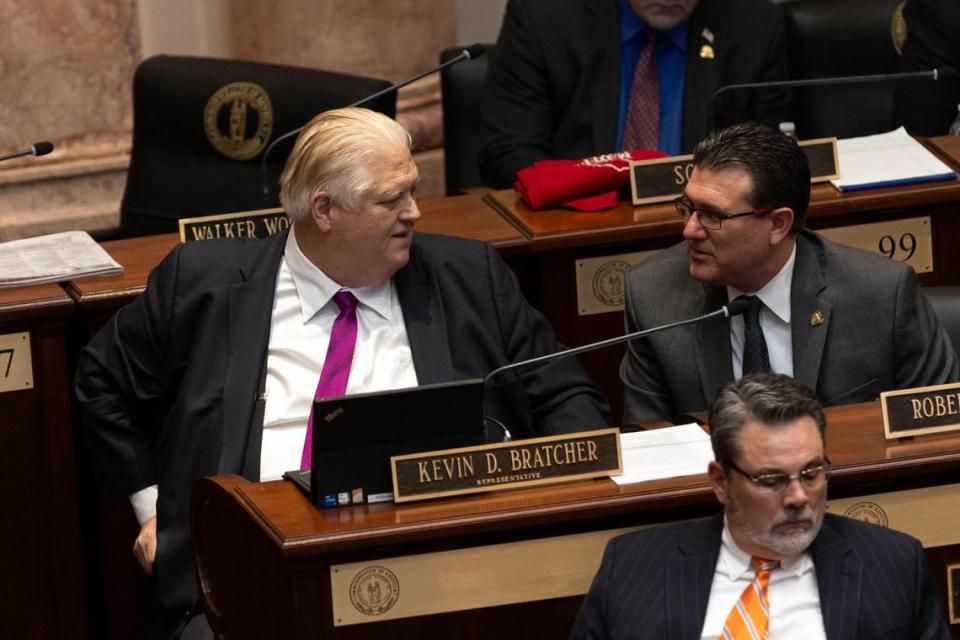 Rep. Kevin Bratcher talks with Rep. Robert Duvall during the legislative session at the Capitol in Frankfort, Ky, Tuesday, January 23, 2024. Silas Walker/swalker@herald-leader.com