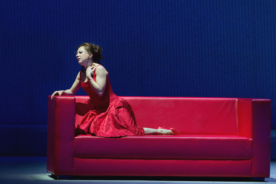 In this Friday, March 30, 2012 photo provided by the Metropolitan Opera, Natalie Dessay plays Violetta in a dress rehearsal of Verdi's "La Traviata," at the Metropolitan Opera in New York. (AP Photo/Metropolitan Opera, Marty Sohl)