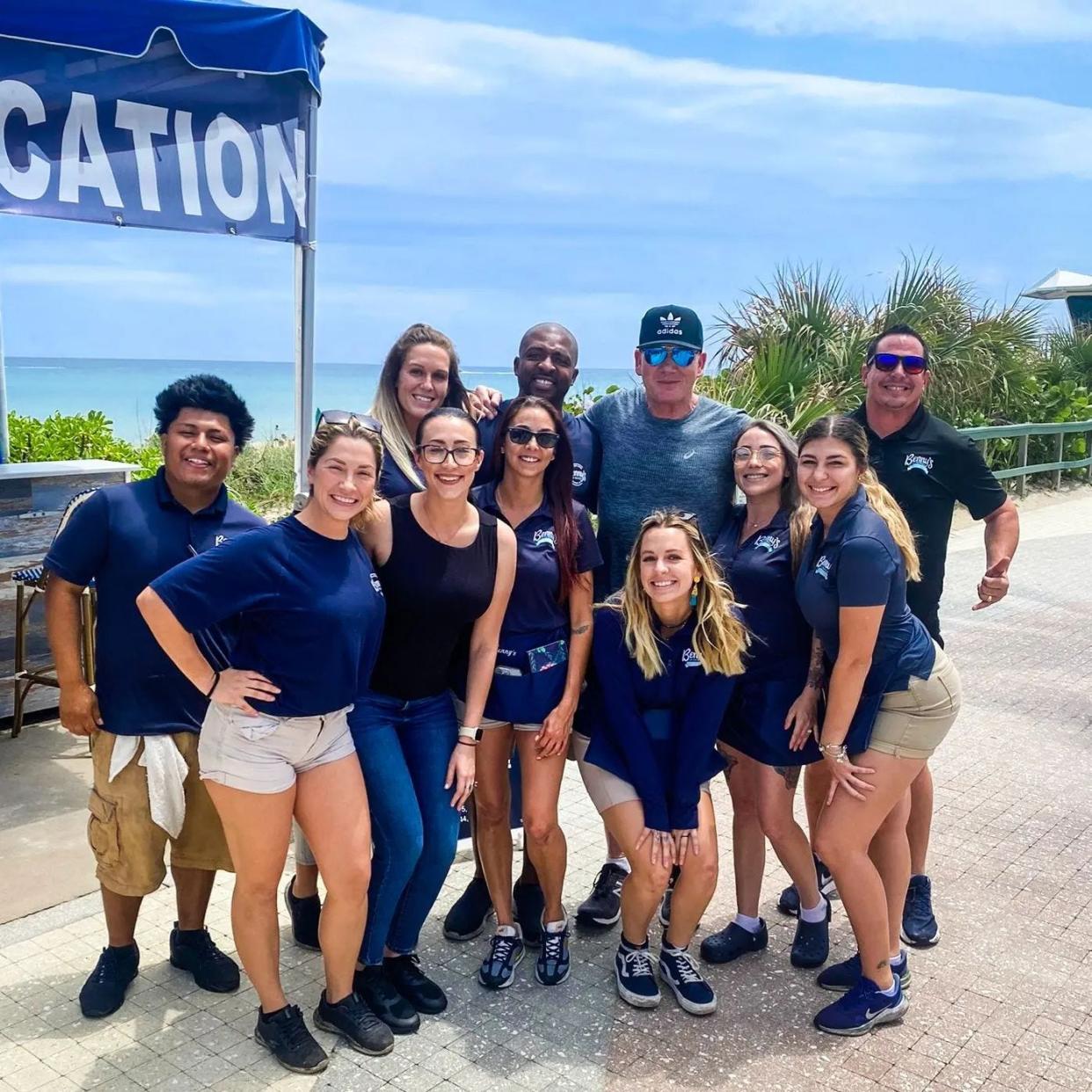 Chef Gordon Ramsay meets with the staff of Benny's on the Beach after stopping by the restaurant on April 8, 2022.