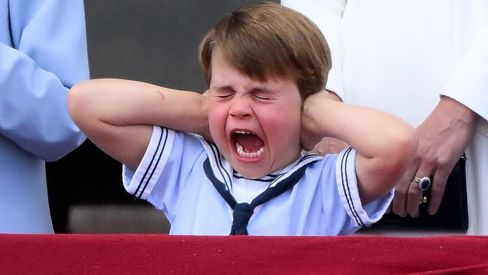 PHOTO: Prince Louis of Cambridge reacts as he watches a special flypast from Buckingham Palace balcony following the Queen's Birthday Parade, the Trooping the Color, as part of Queen Elizabeth II's platinum jubilee celebrations, in London, June 2, 2022. (Daniel Leal/AFP via Getty Images)