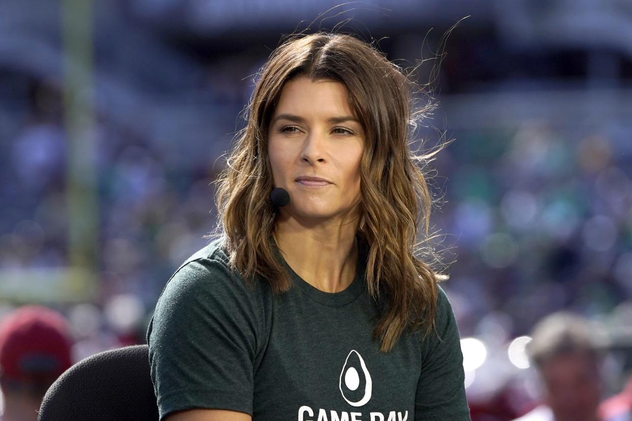 Danica Patrick sits on the set of ESPN's "College Game Day" program before a football game between Wisconsin and Notre Dame on Sept. 25, 2021, in Chicago. 