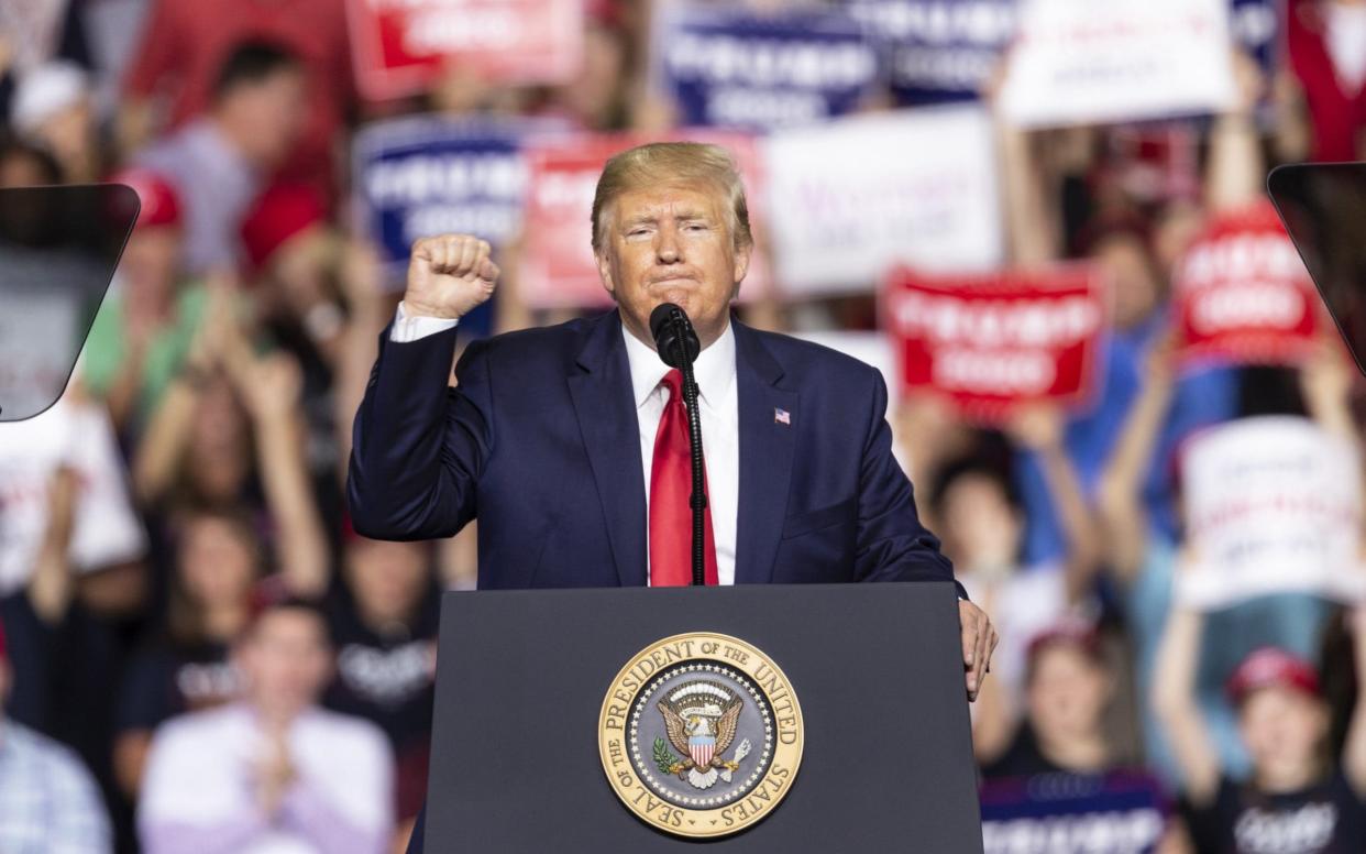 U.S. President Donald Trump speaks during campaign MAGA (Make America Great Again) rally at Southern New Hampshire University Arena, in Manchester, New Hampshire - Anadolu