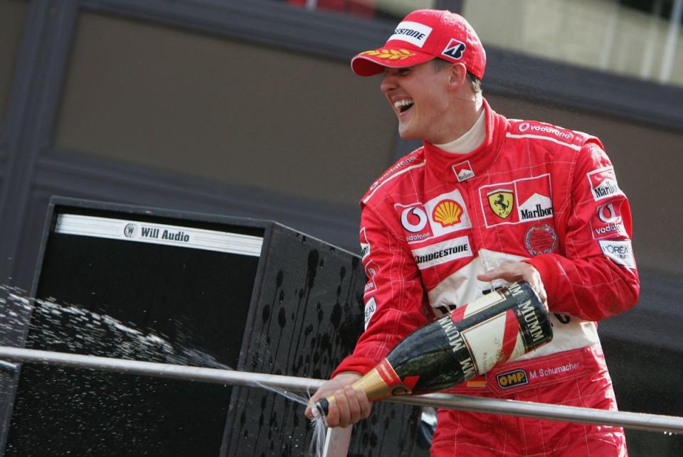 Schumacher celebrates his seventh F1 world title at Spa in 2004 (Getty)